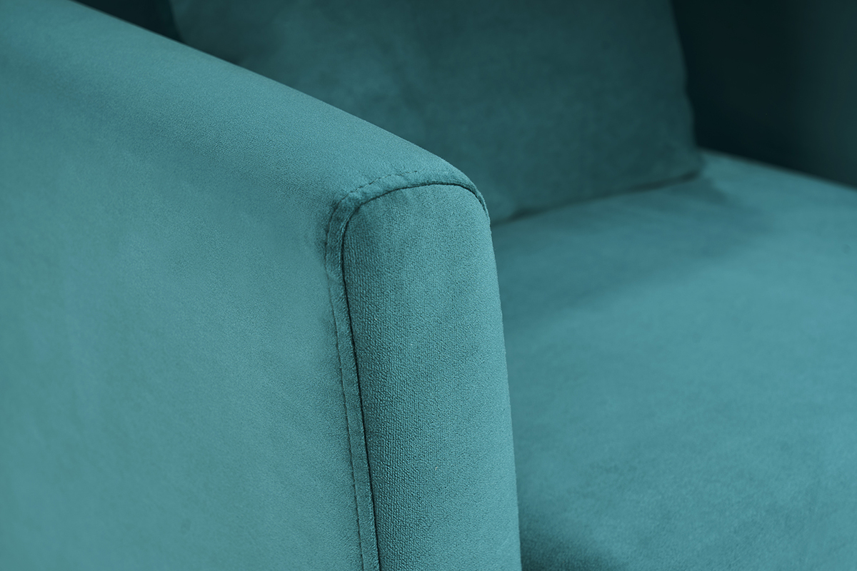 Detail des petrolblauen Samtstoffs eines Sessels, Nahaufnahme.