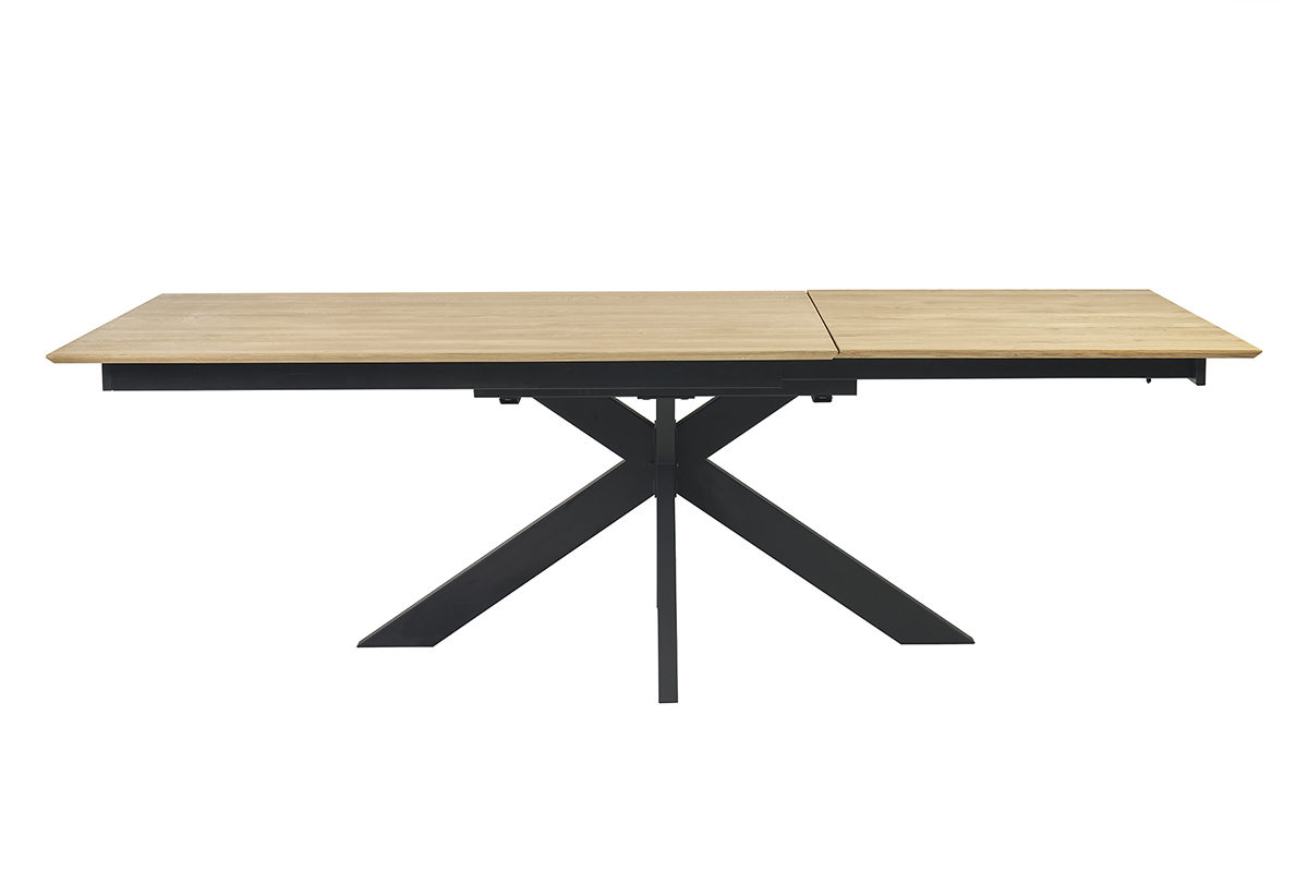 Ausziehbarer Esstisch aus massiver Eiche mit Kreuzfu, Frontansicht.