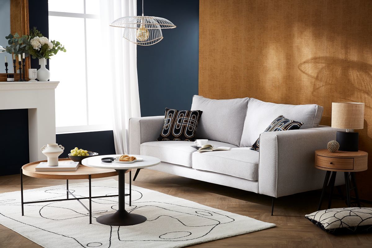 Design-Sofa aus beigem Stoff mit schwarzem Metall 4-Sitzer OSMANN