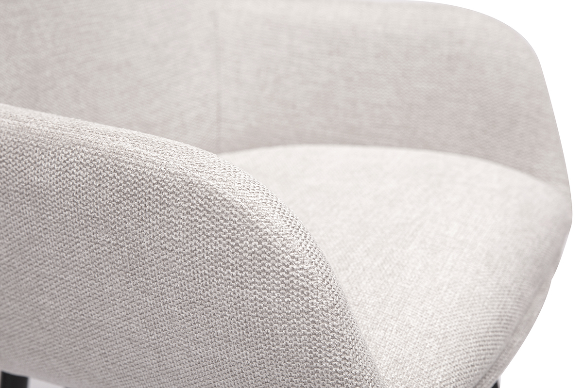 Nahaufnahme eines Barhockers aus beigefarbenem Stoff mit strukturiertem Samteffekt.