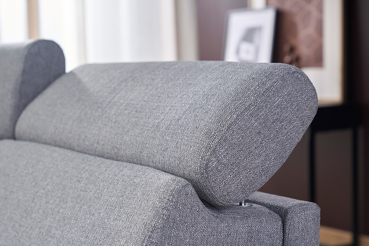 Detailansicht eines grauen Schlafsofas mit verstellbaren Kopfst�tzen in Nahaufnahme.