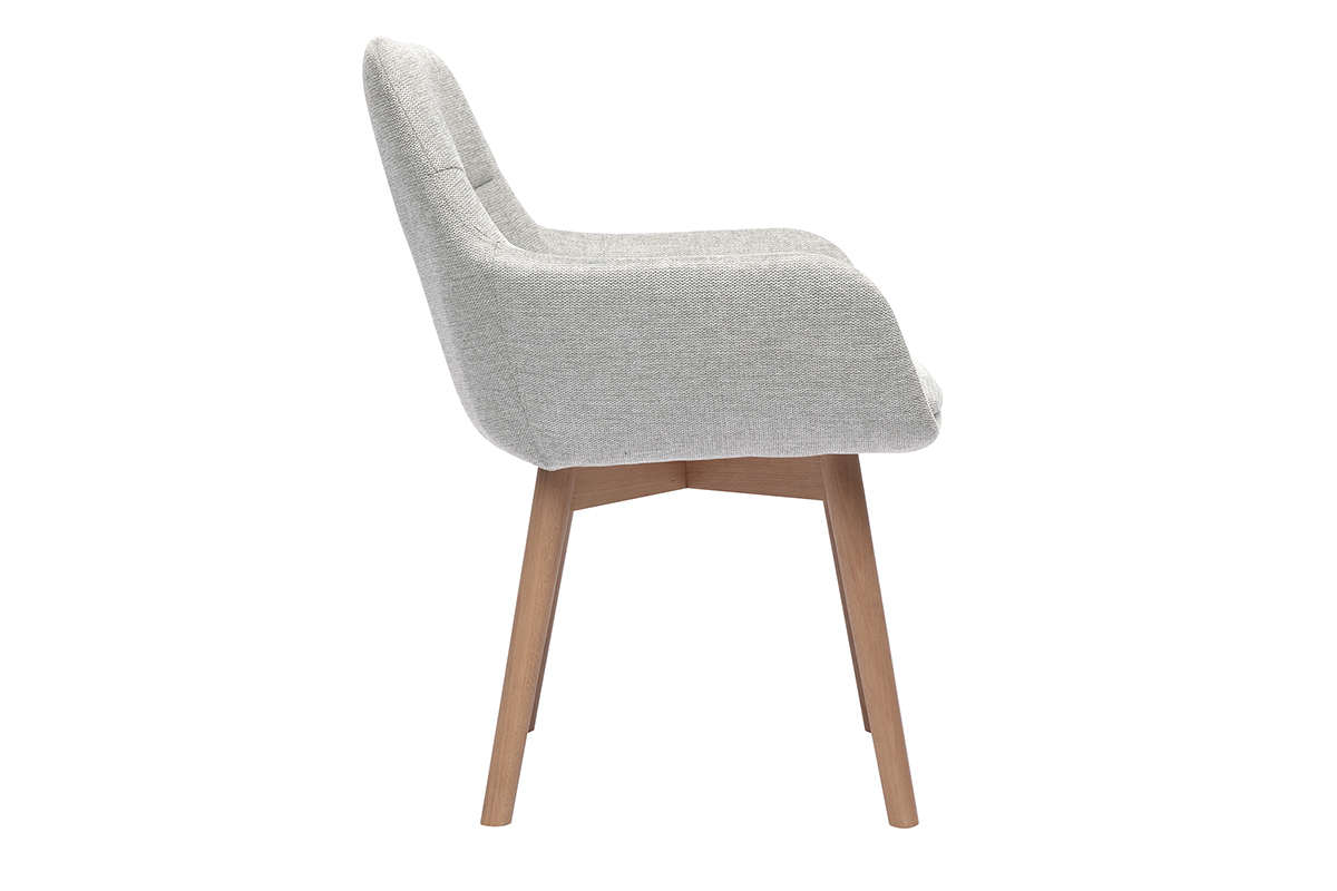 Stuhl aus hellgrauem Samtstoff, Seitenansicht, mit hellen Holzbeinen.